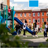 William D. Kelley Elementary School students playing outside the school